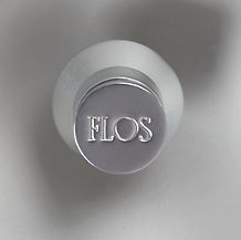 Flos Wan wall-/ceiling light white - Each Wan bears the logo of Flos prominently visible in the middle of the diffuser.