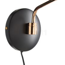 Northern Birdy Swing Applique noir/laiton - Grâce à son articulation pivotante, l'ensemble de la lampe tourne à 180°.