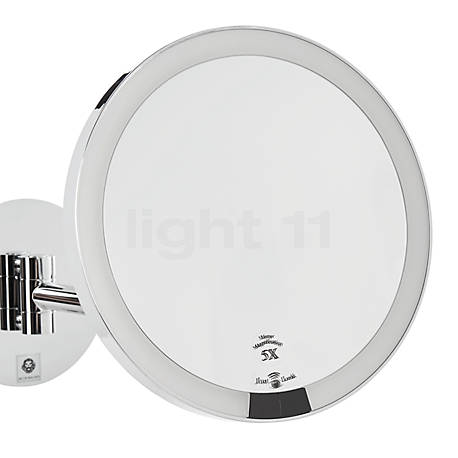 Decor Walther Just Look Wall-Mounted Cosmetic Mirror LED with direct mains connection chrome glossy - Enlarge 7-fold - The five times magnifying mirror houses its light sources invisibly inside the casing.