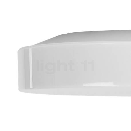 Flos Button kunststof - ip44 , uitloopartikelen - De vlakke diffusor  van de Button plafondlamp bestaat afhankelijk van de uitvoering uit opaal polycarbonaat of opaalglas.