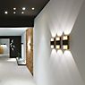 Delta Light Want-It, lámpara de pared LED negro/dorado - 18 cm - ejemplo de uso previsto