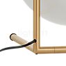 Flos IC Lights T2 messing mat - The supply line is unobtrusively connected to the back of the table lamp.
