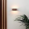 Light Point Aura, lámpara de pared LED oro rosa - 16 cm - ejemplo de uso previsto